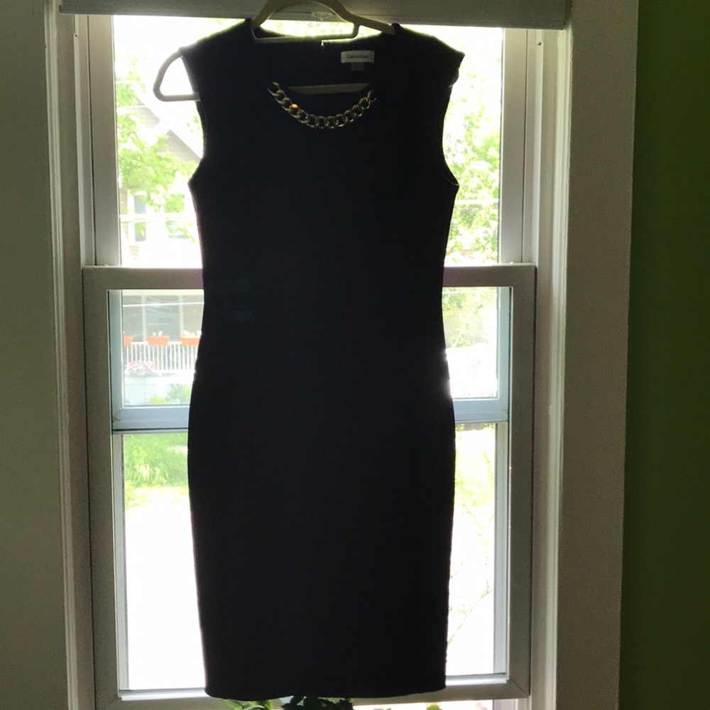 Purple Calvin Klein size 8 dress with chain